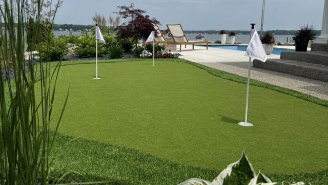 artificial turf golf area in backyard